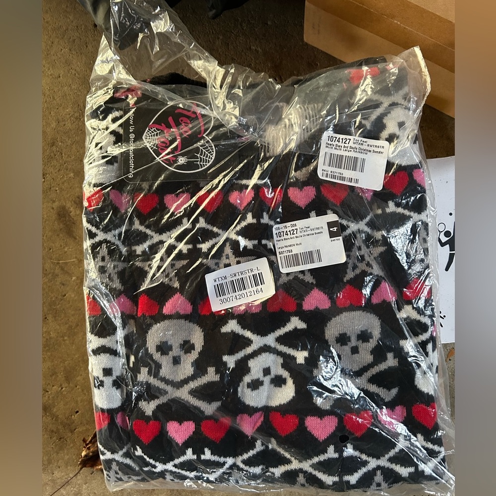 Dolls Kill Too Fast skull hearts sweater.  Brand new